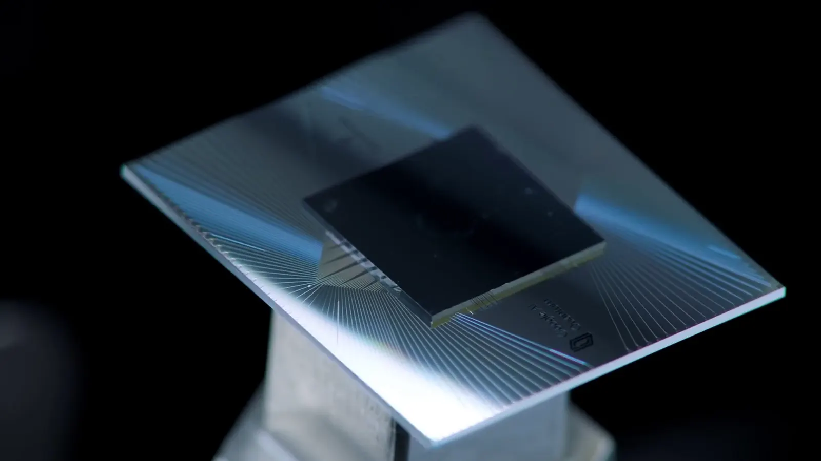 Contextual file photo of a Google Quantum AI superconducting processor chip, the Sycamore, mounted on its package; Willow itself is not shown.